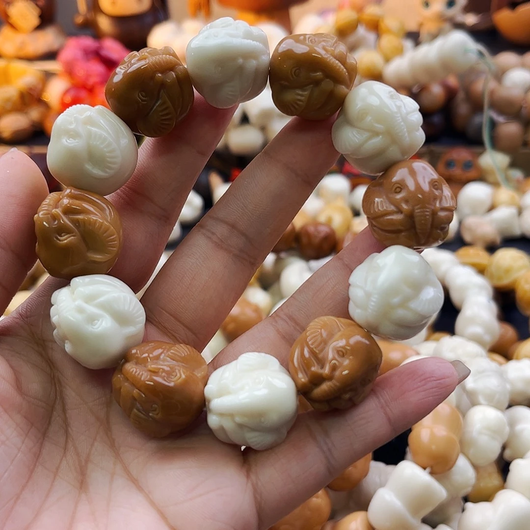菩提根/象牙果手串双拼小象