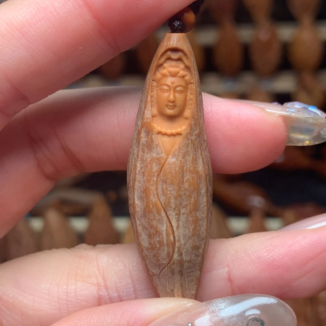 把件橄榄核包衣观音