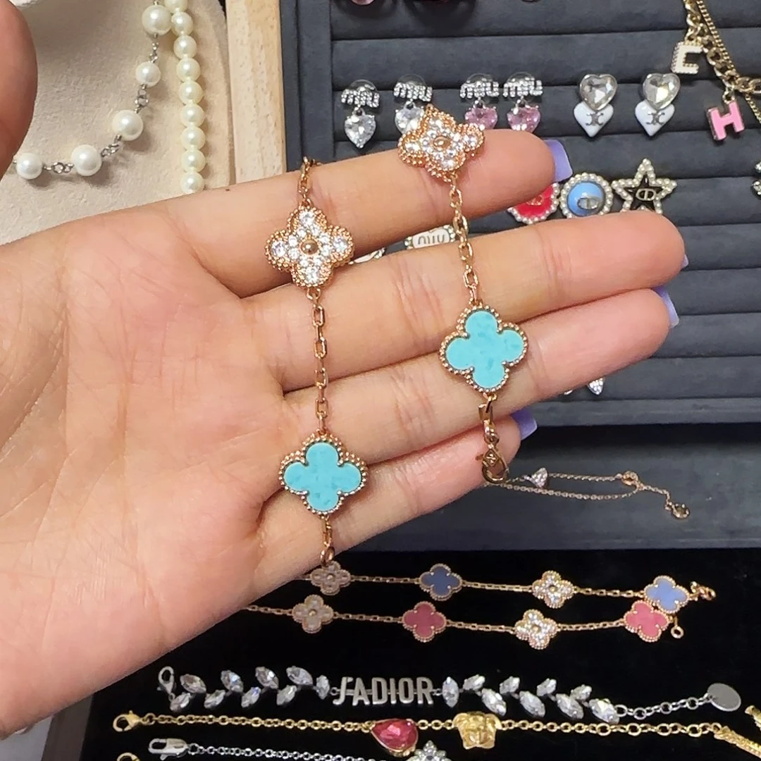 芋****无铜合金五花蓝绿色手链