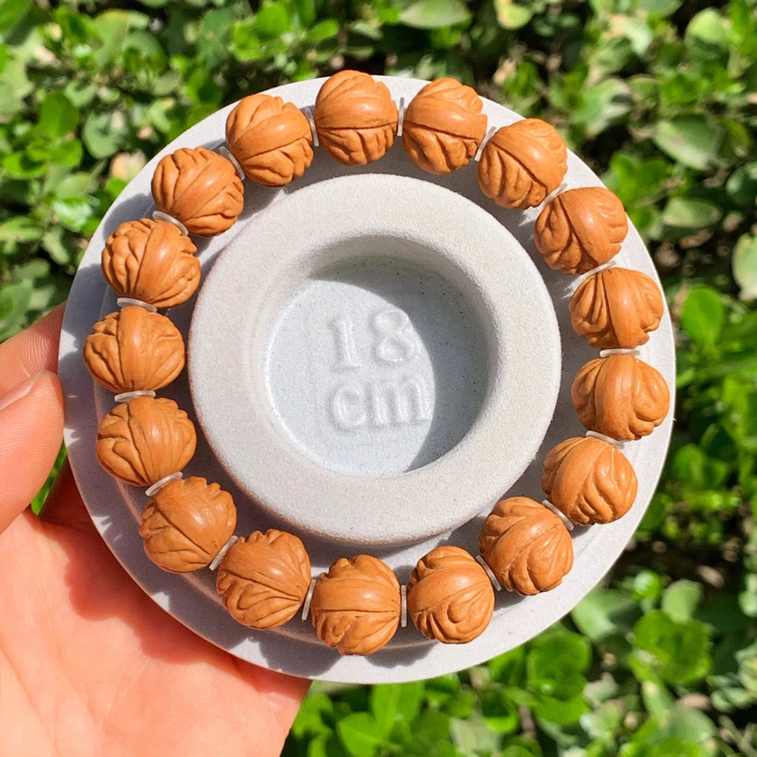 秦岭野生肌肉纹玉龙脊桃核油性大皮质细腻骨质坚硬小金豆桃核手串