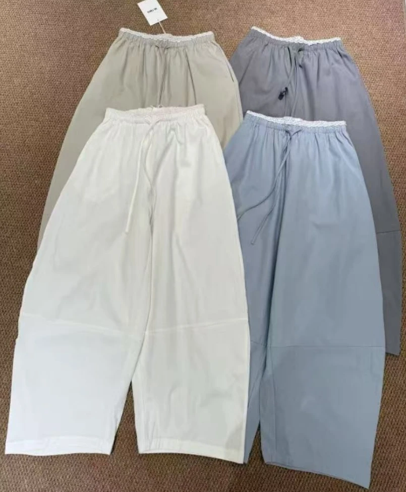 温柔瑶-MTWO#休闲显瘦蕾丝拼接腰头弯刀裤#9905