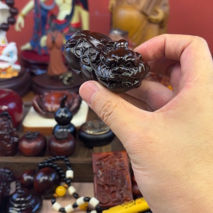 风车木（黑檀木）无事牌貔貅有什么