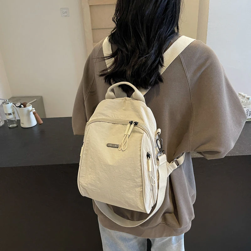 大容量通勤旅行双肩包单肩手提包包女轻便牛津布背包时尚休闲百搭