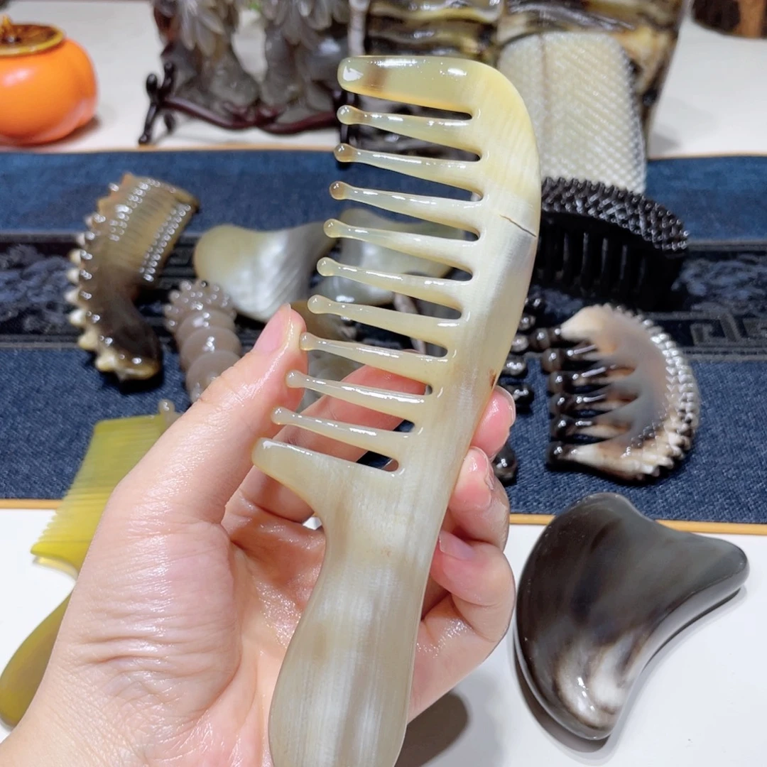 白水牛角手柄水滴梳