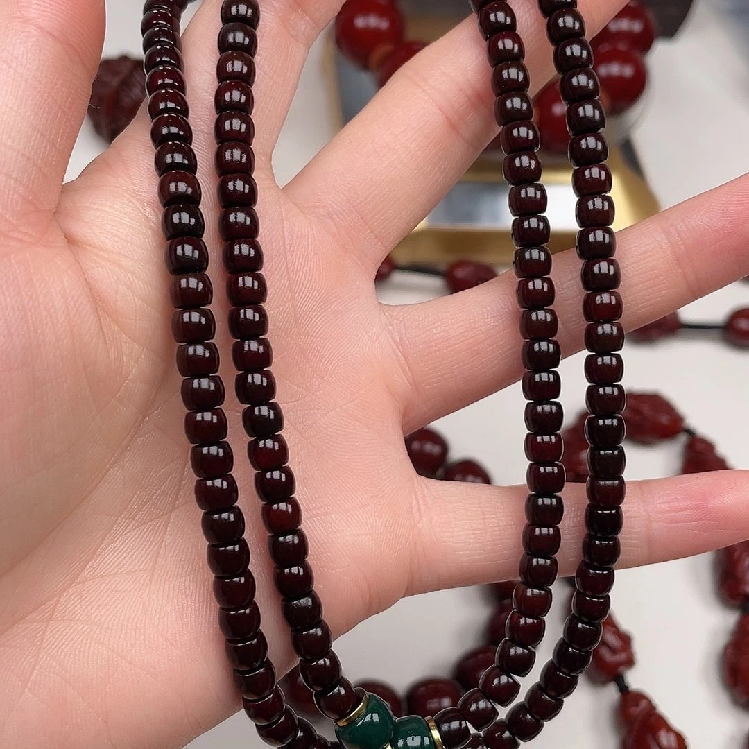 A***）橄榄核吊坠核尖直切脖挂