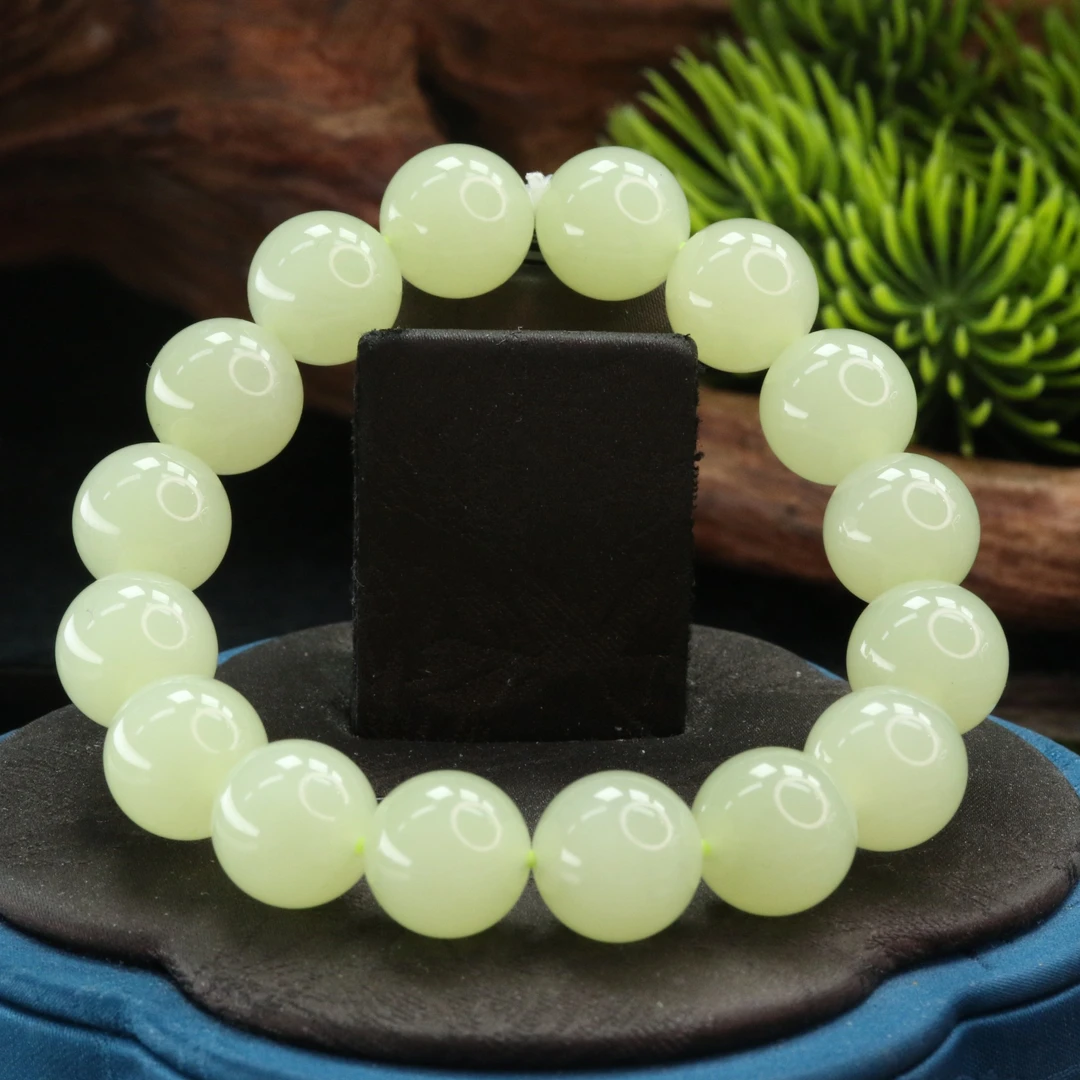 56和田玉若羌黄口手串/400374上海嘉禾拍卖