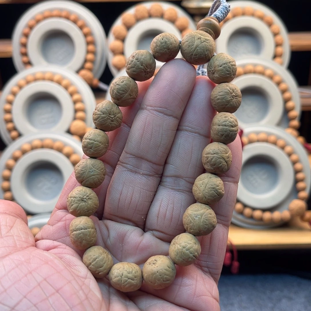 凤眼菩提吊坠14毫米奶油皮同树籽龙眼手串