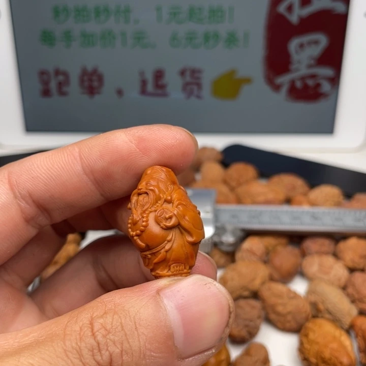 橄榄核吊坠橄榄核雕刻单子。