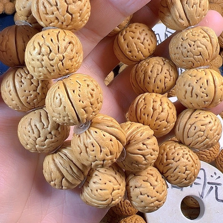 ＃***哥吊坠桃核国核滚像手持