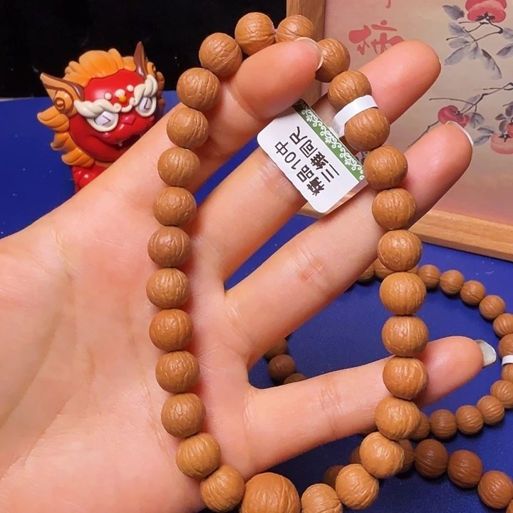 ****猴头核桃手串凤羽