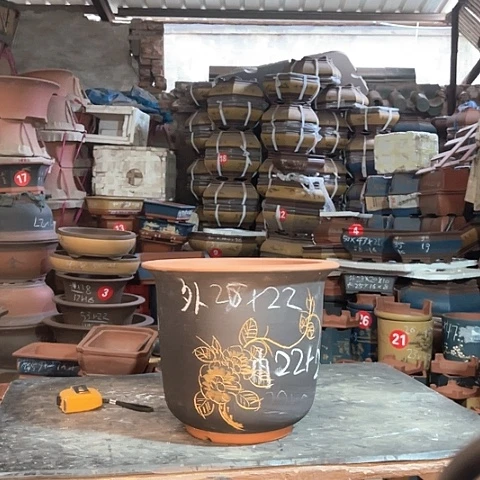 紫砂花盆金钟一个