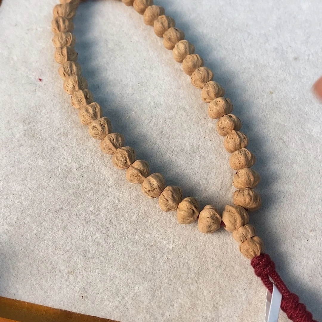 柏香籽/百香籽吊坠五*儿M05