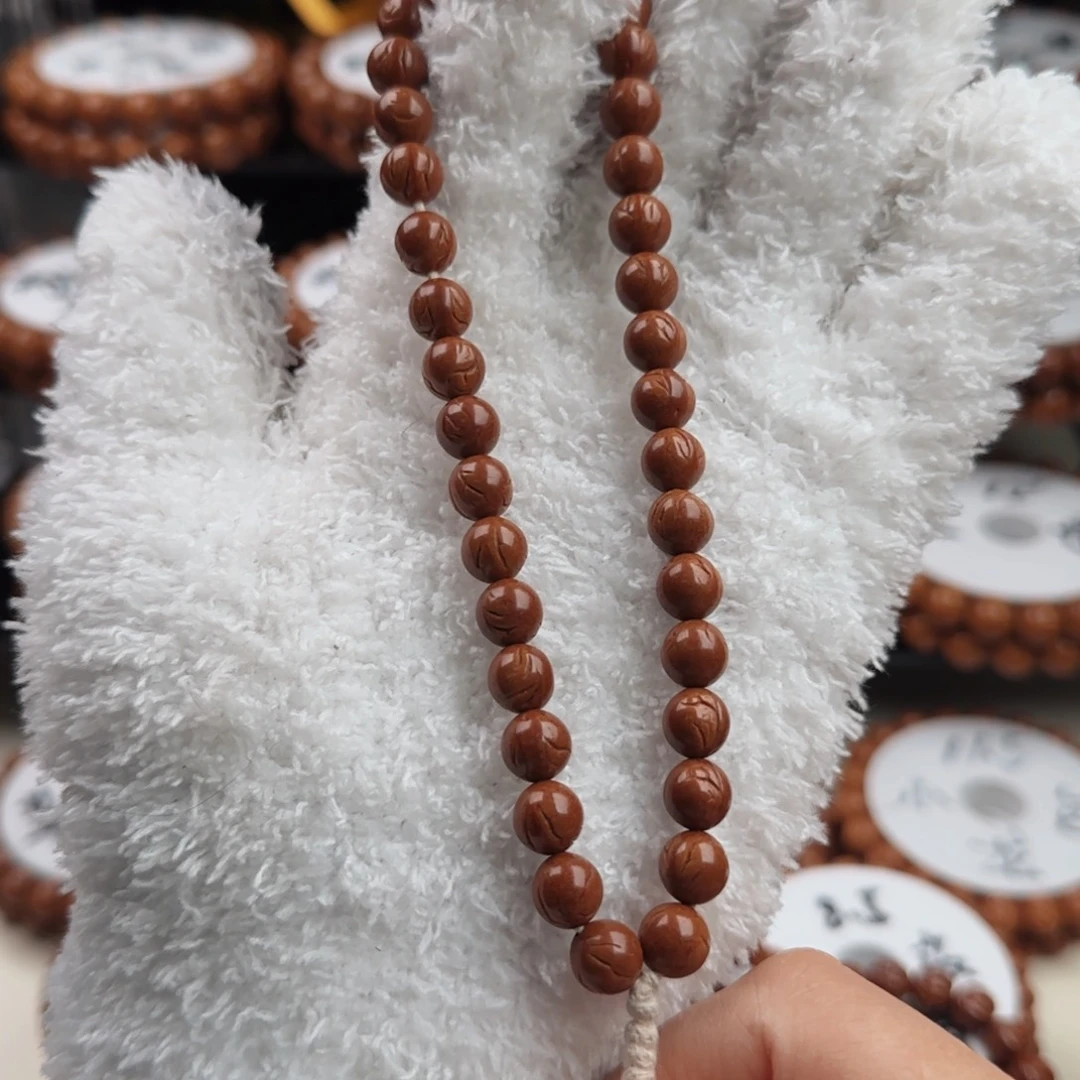 吊坠桃核龙纹桃核正圆光珠手持