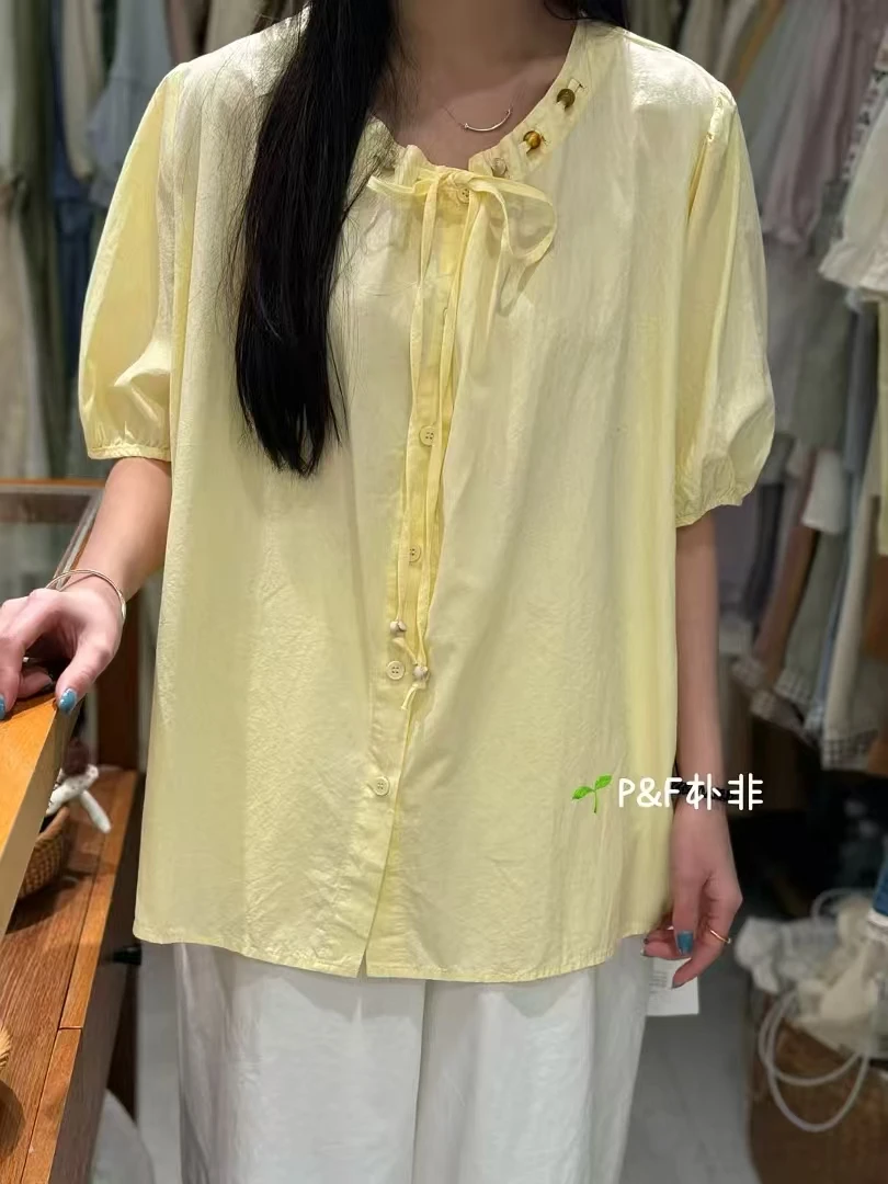 别出新裁863261抽绳珠珠领结短袖衬衣   衣长64