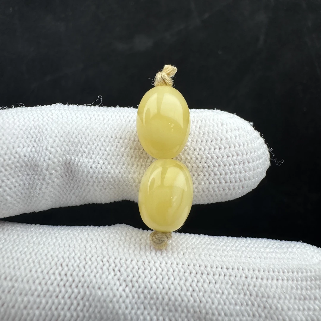 K2634天然原矿蜜蜡 对珠8.4mm支持鉴定 假一罚十