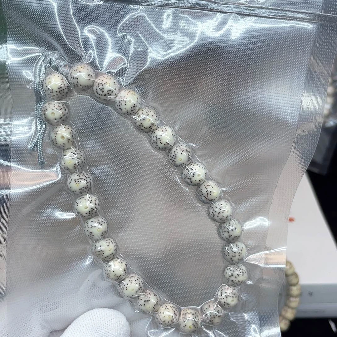 星月菩提手串9圆石玉料同枝果骨瓷白手持头