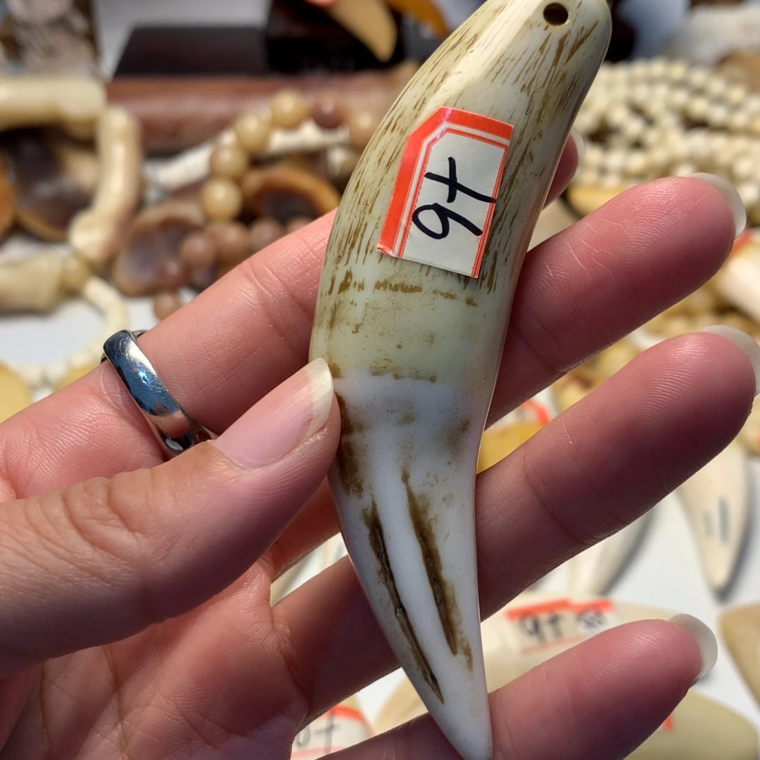 驼骨把件驼骨把件深色牙牙