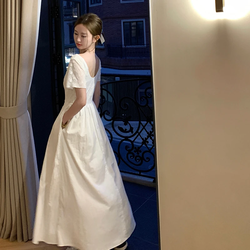 肉完  新款显瘦一字领 白色连衣裙