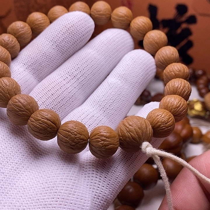 吊坠猴头核桃凤羽