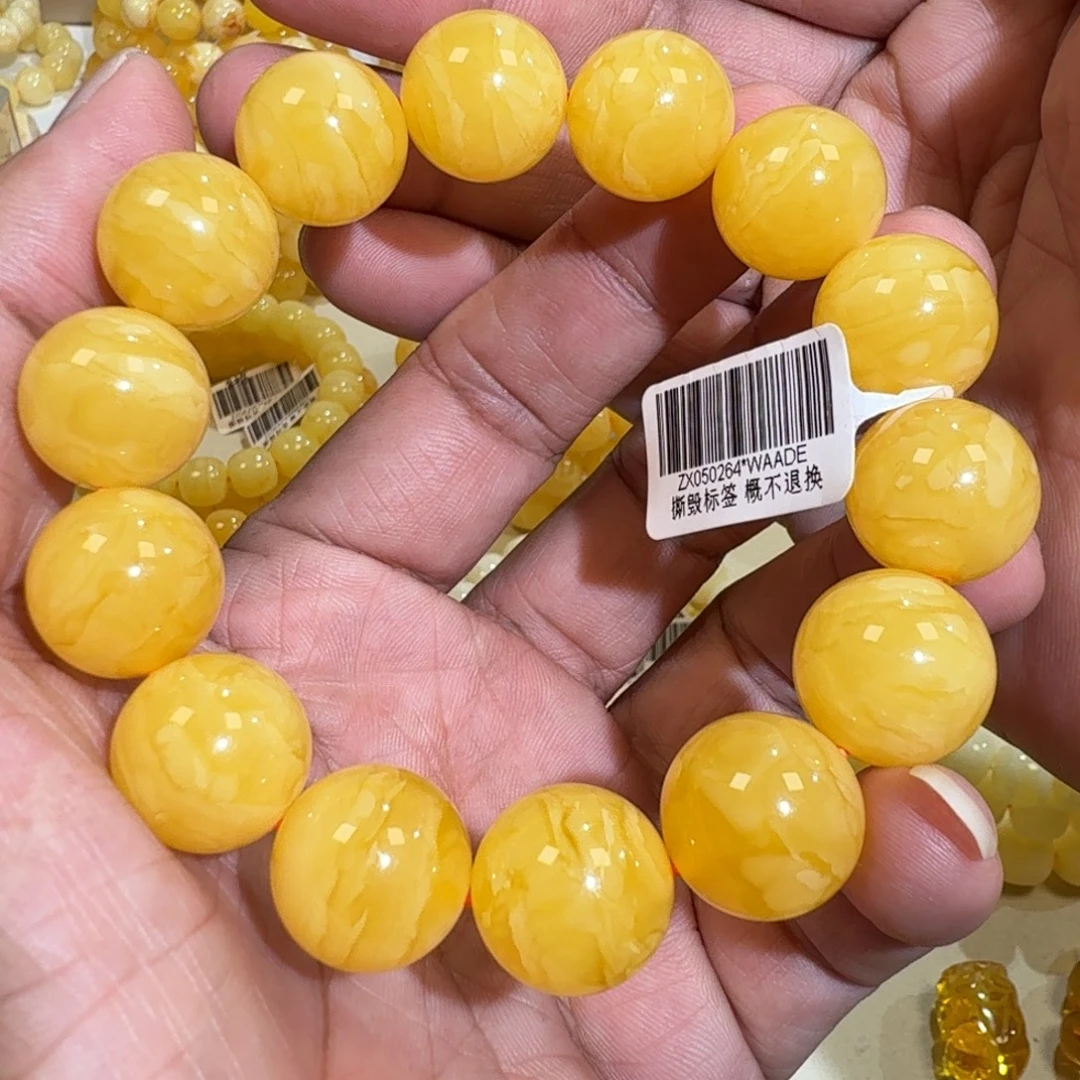 琥珀未镶嵌珠宝奇石16.2m焦皮同料橘黄浓蜡圆珠串33.5