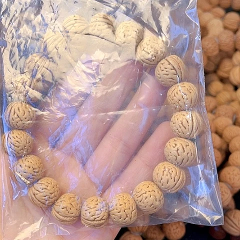 桃核吊坠王****）桃核手串