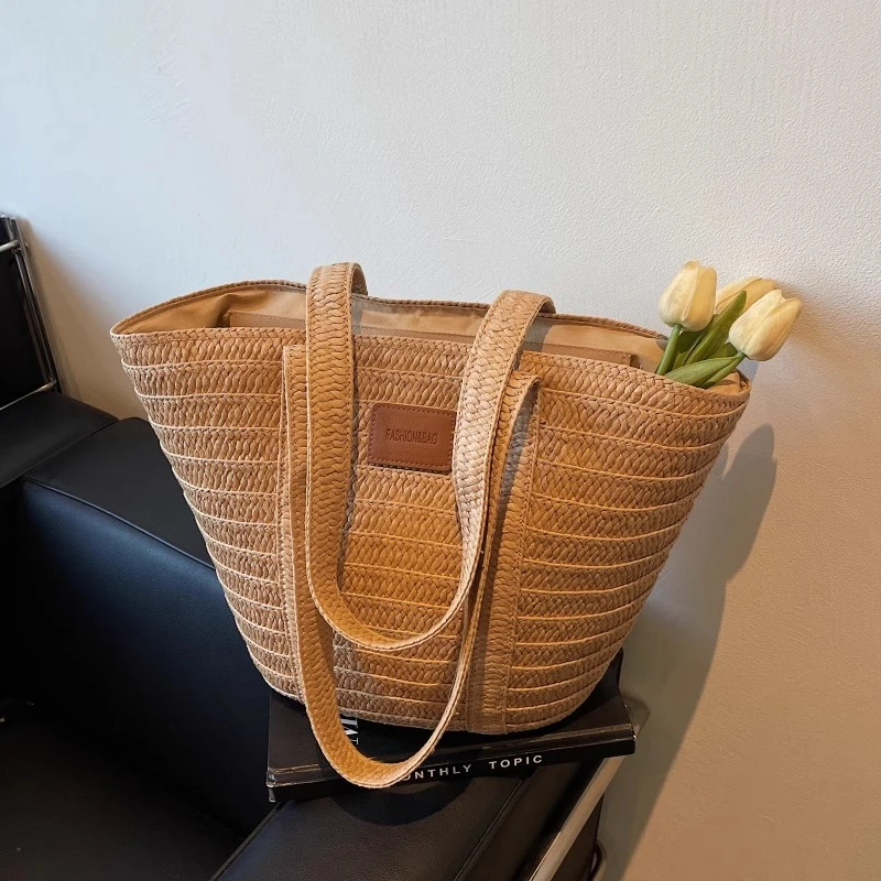 海边度假草编包包女2025新款大容量编织水桶包百搭单肩通勤托特包