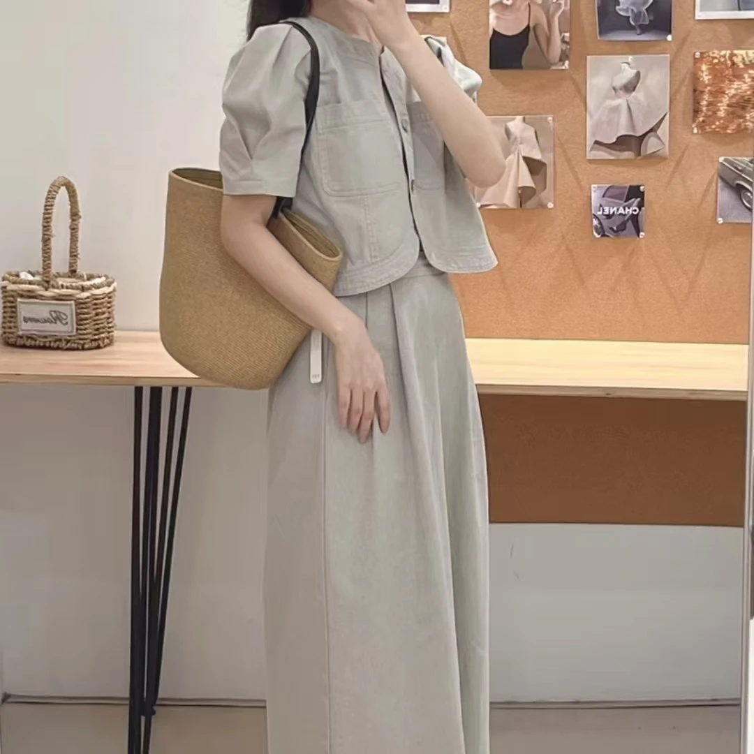 单根单肩包抽绳夏季主袋休闲包女通用水桶包百搭简约