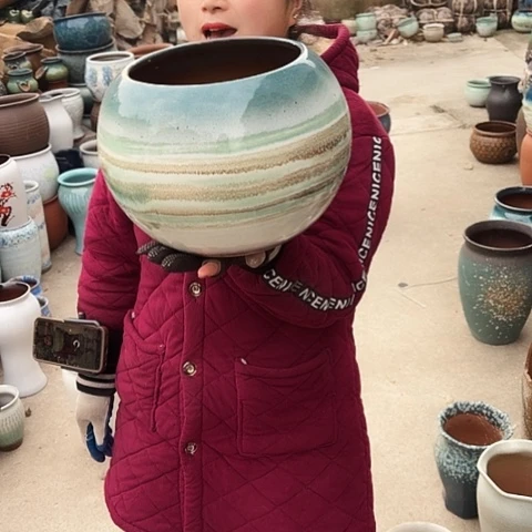 口19高22瑕疵盆子。