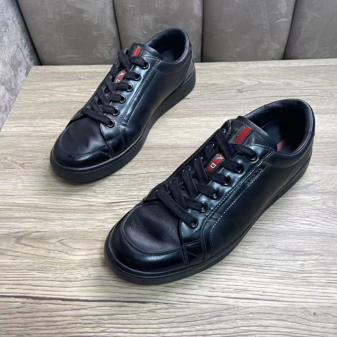 95新 Prada/普拉达 黑色男士红标logo时尚百搭板鞋 42.5码/