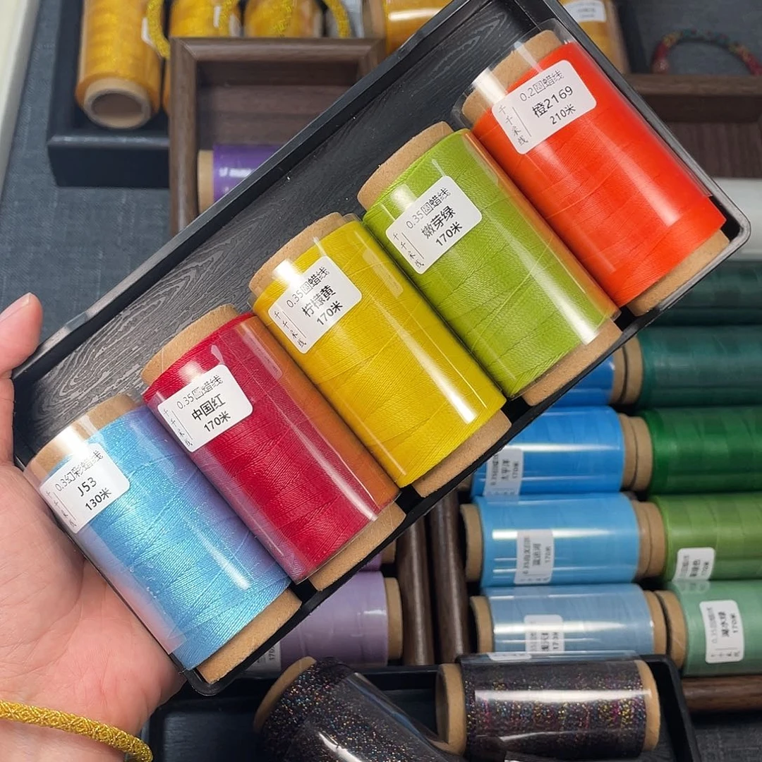 聚酯纤维0.3幻彩53➕0.35圆蜡中国红➕柠檬光➕嫩芽绿➕2169