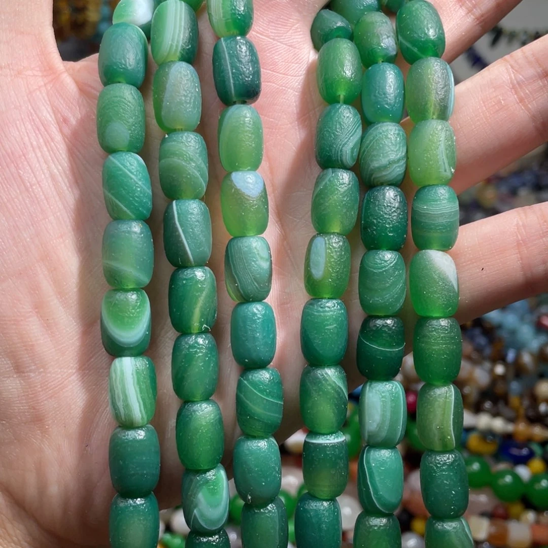 石英质玉，橘皮缠丝玛瑙桶珠10×13mm一条，未镶嵌