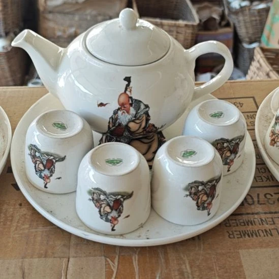 库存微瑕老寿星多孔茶壶一套