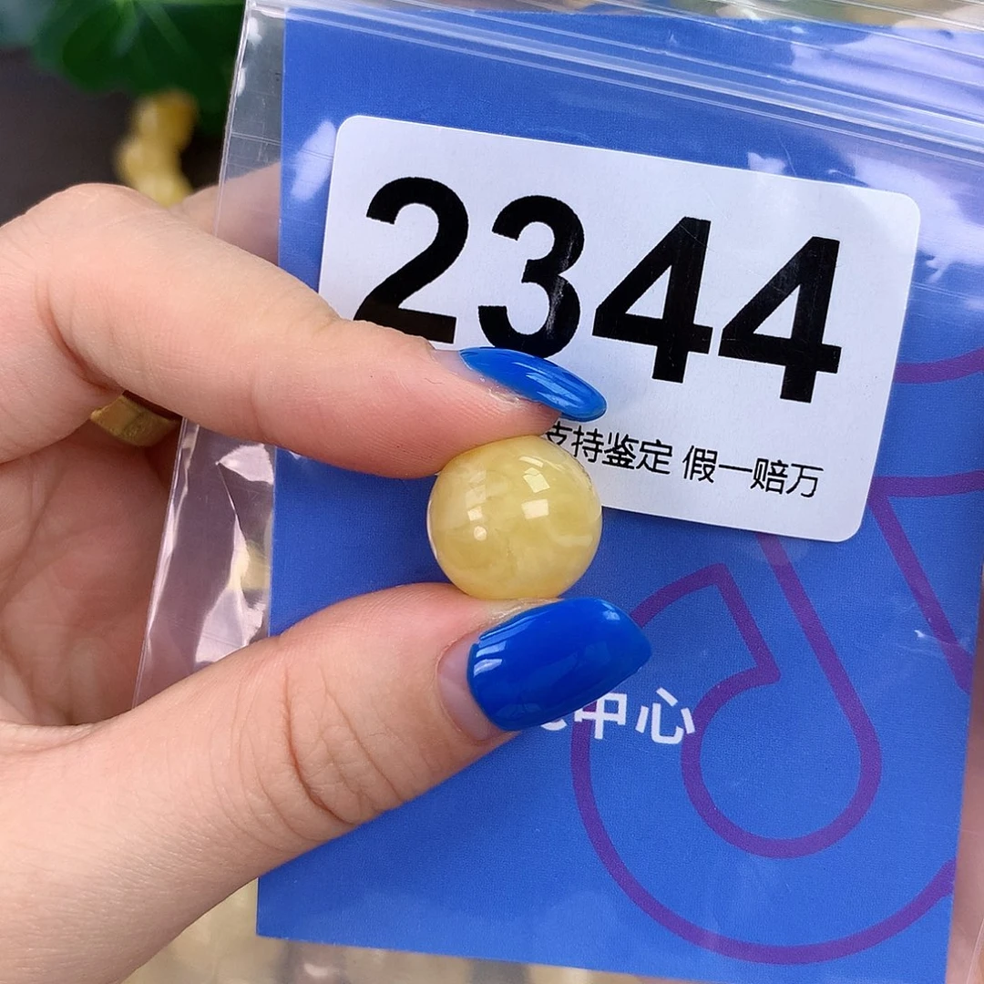 琥珀未镶嵌珠宝奇石14.6mm 粉头 沙眼
