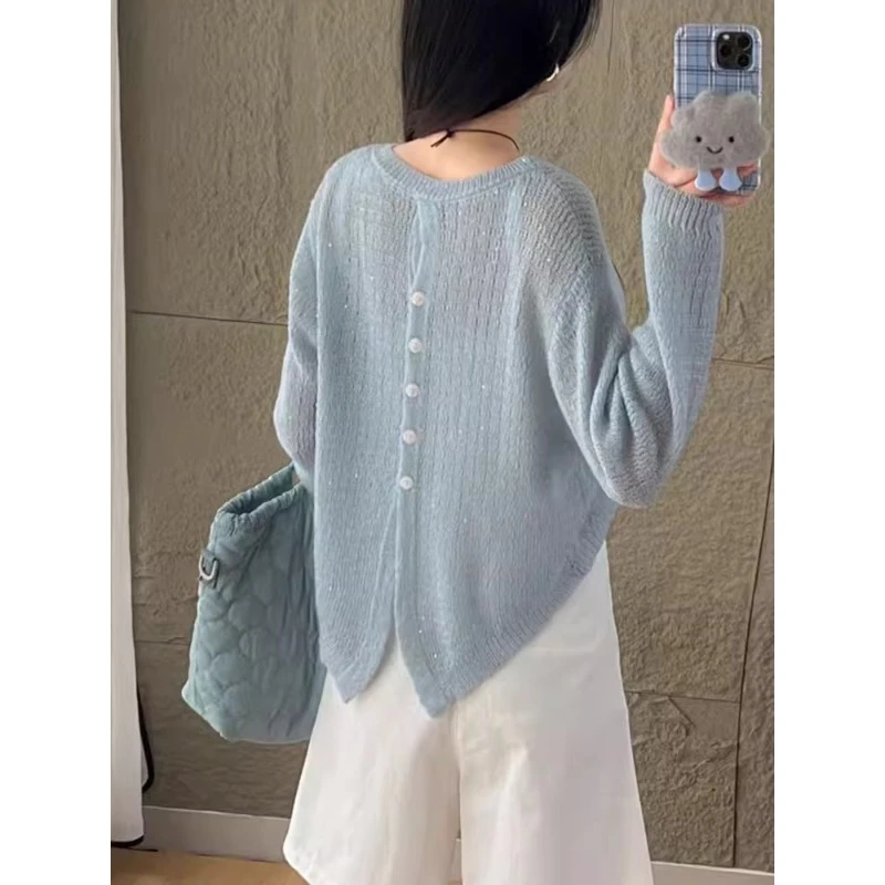 2025秋冬新款后背纽扣设计感针织罩衫女短款亮丝薄毛衣长袖镂空衫