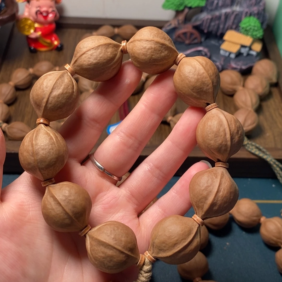 皮***生橄榄核手串/手链2227梅林铁三花橄榄核