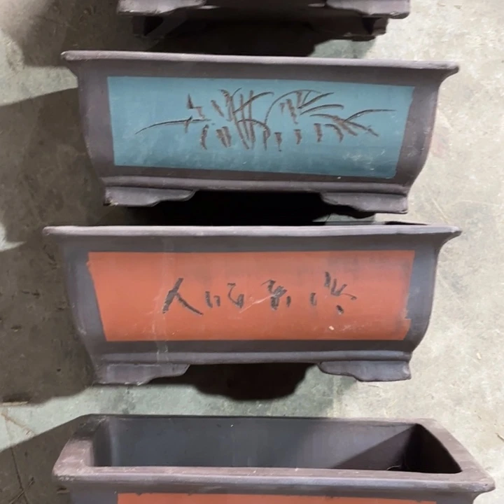 紫砂花盆100-4。