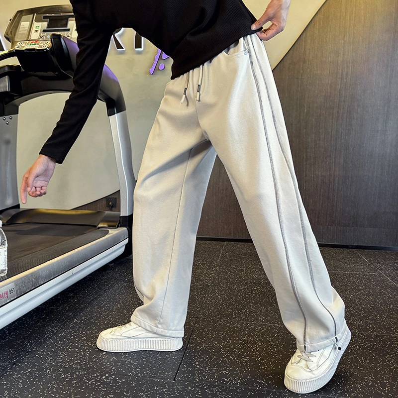 仓石一树潮牌秋冬条纹设计宽松休闲裤男士运动时尚弯刀直筒运动裤