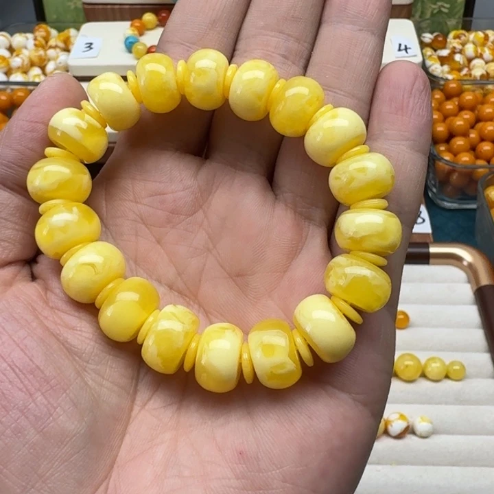闫***荣无非金属鸡油黄色算盘珠