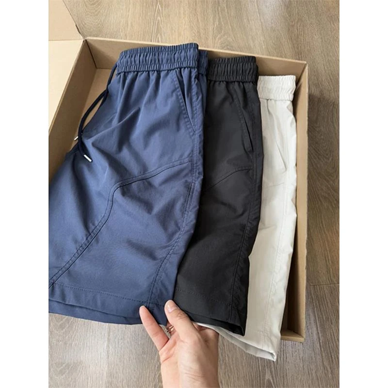 藏青色斜切冰丝短裤男款夏季薄款美式运动篮球速干裤子休闲四分裤