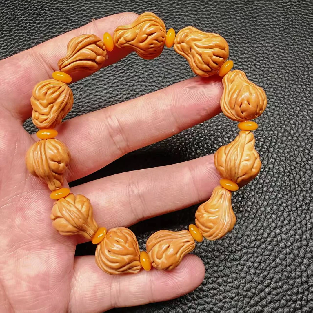 尺寸13~14mm左右桃核雕刻单圈一条多样性发货