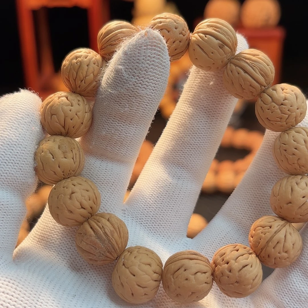 不***的手串桃核盘锦小肌肉