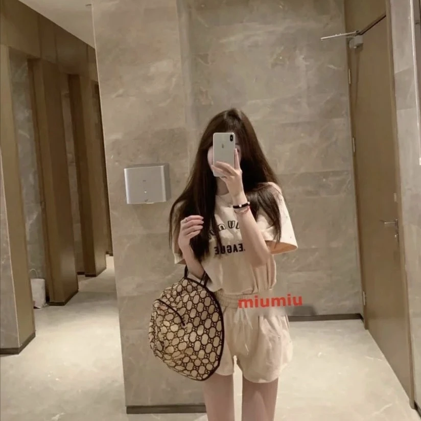 全新未使用 MIU MIU/缪缪 001635 后置Logo印花短裤 藕粉色 40码