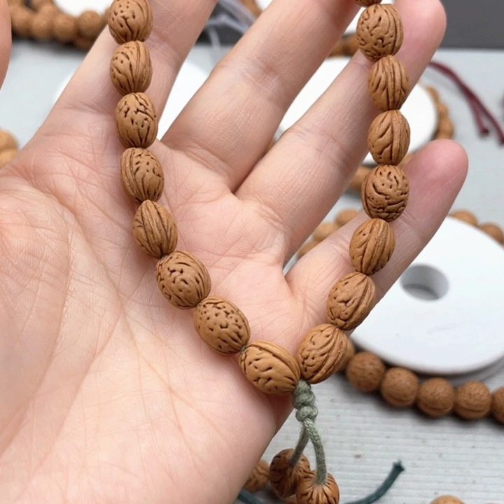 格****心0.85尺寸野生桃核手持