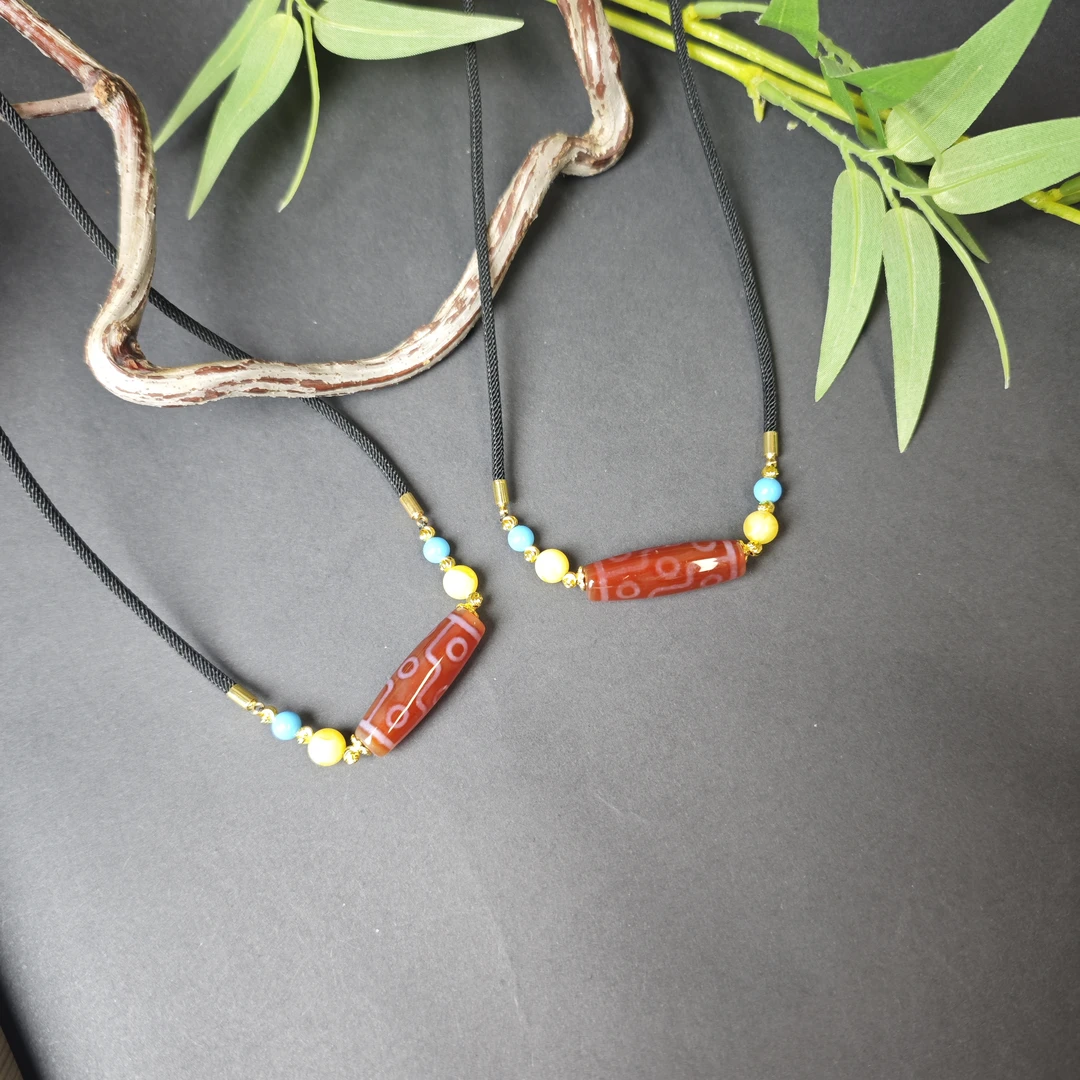 红肉九眼天珠玛瑙吊坠-多样性发其一-y2312