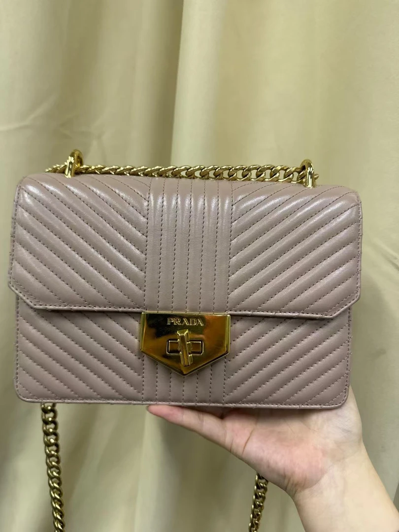 95新 Prada/普拉达 奶茶色单肩包