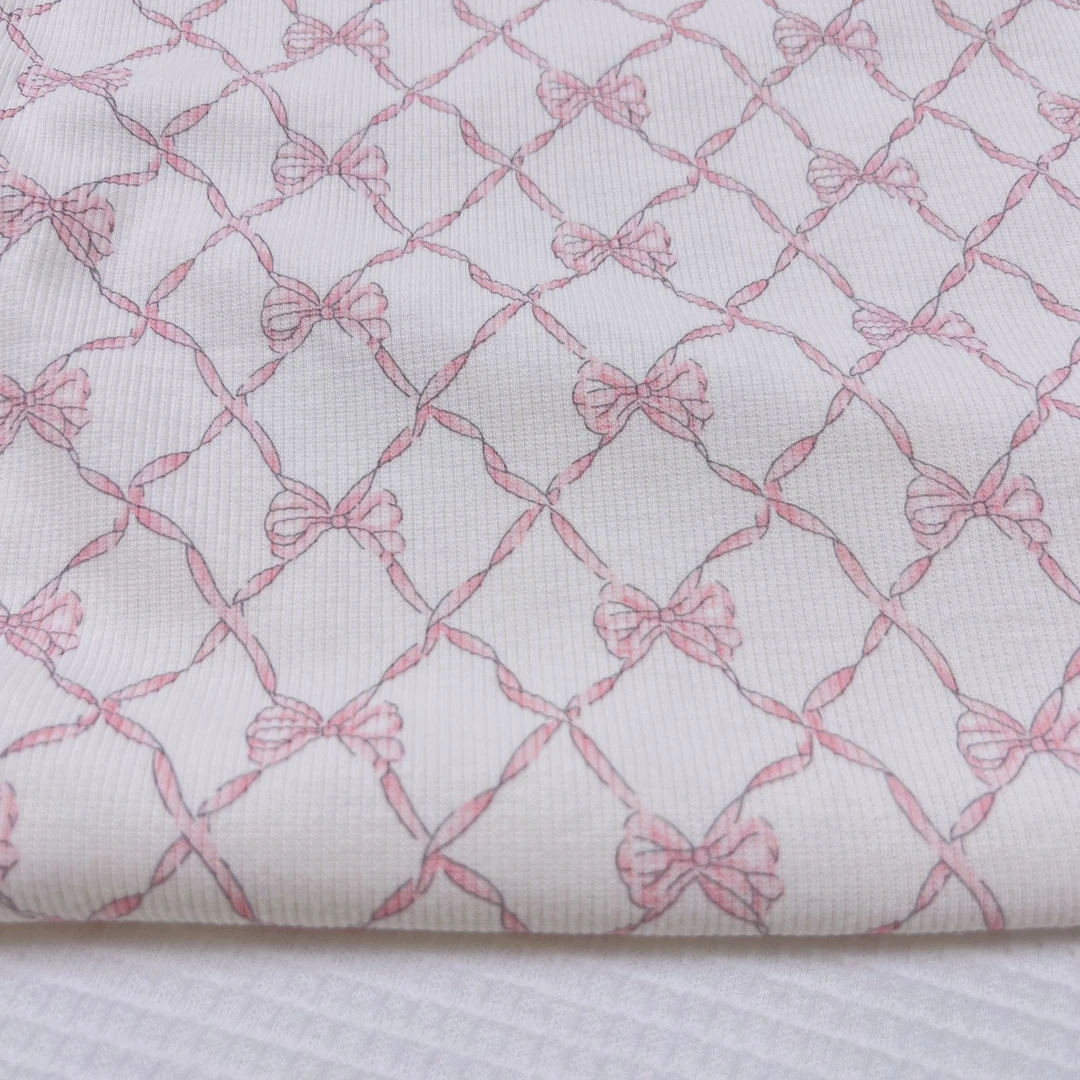 T426纯棉白色蝴蝶结坑条弹力针织面料一米【宽1.25】