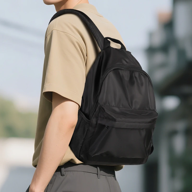 休闲黑色书包男包大学生初高中性轻便女大容量旅行旅游电脑背包