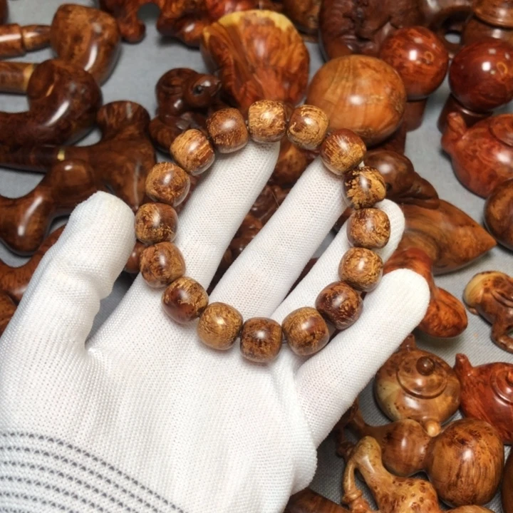 爱***贝麻梨疙瘩火琉璃手把件手串1314