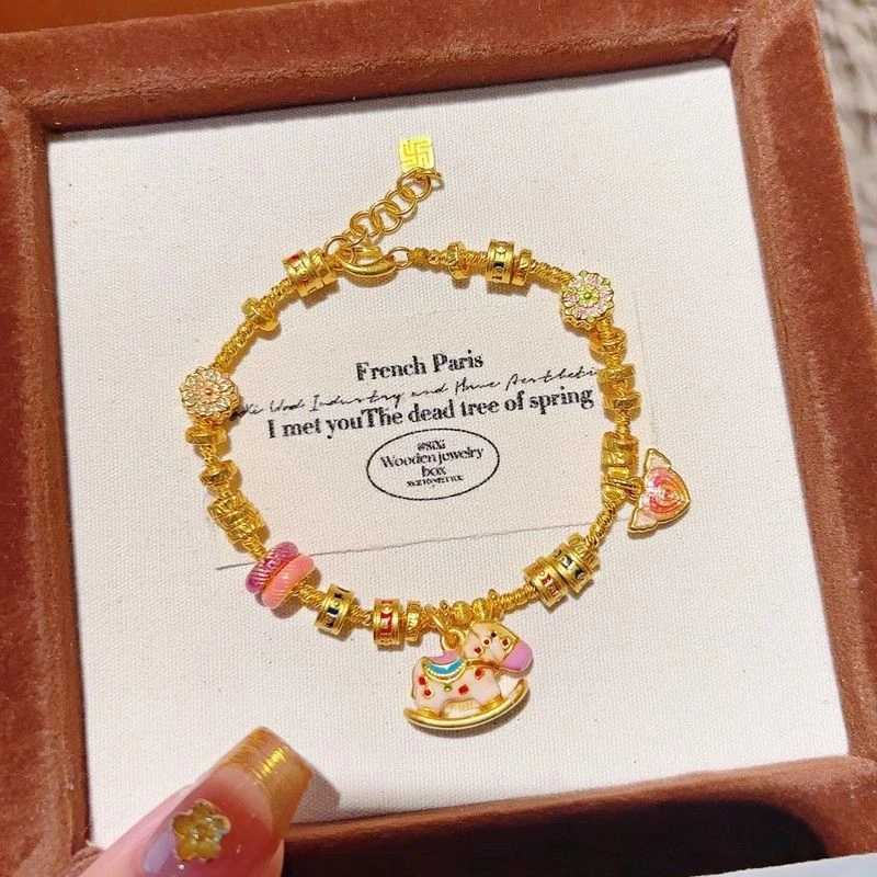 铜合金手链 轻奢金色小木马手链女新款盘缠编织莲花爆闪手串百搭