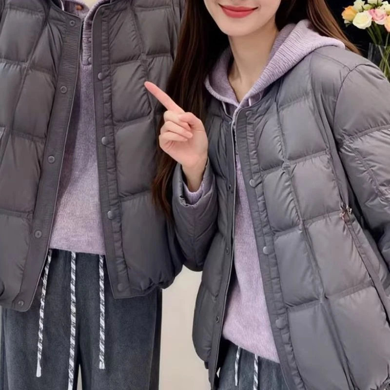 慵懒日常百搭优雅治愈风2026冬季纯色棉服女款通勤出街暖柔显清新